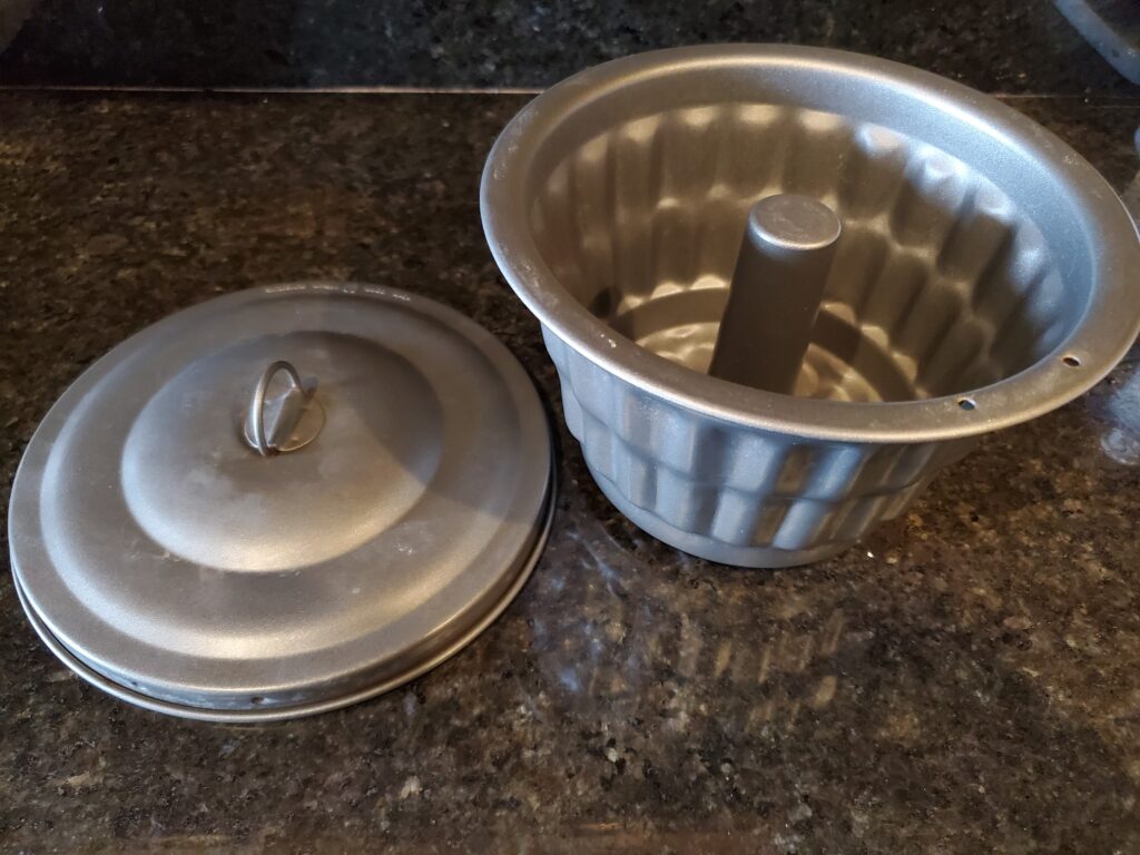 A metal pan sitting on top of a counter.