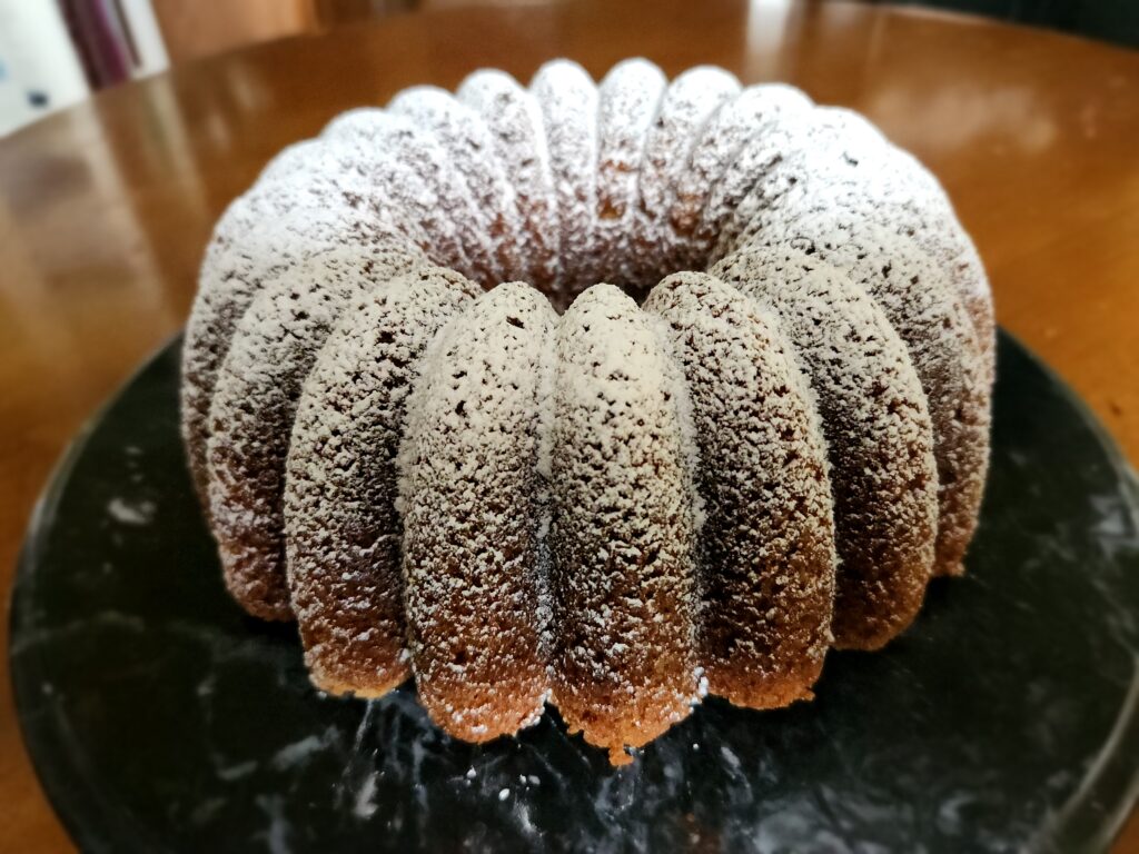 A bundt cake that is on top of a table.