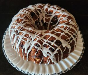 A bundt cake with icing on top.
