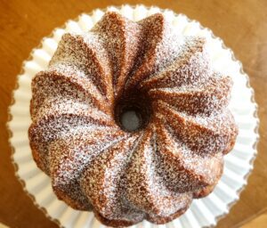 A bundt cake with powdered sugar on top.