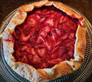 Strawberry galette with flaky crust.