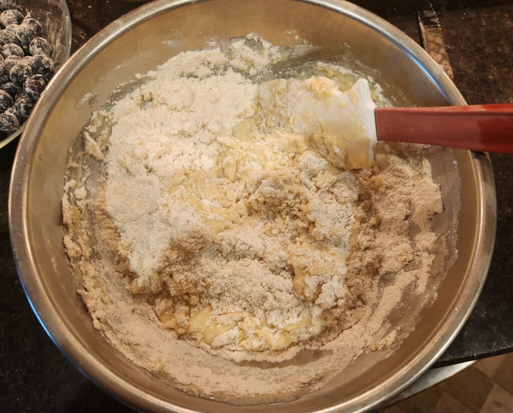 Mixing ingredients in a bowl for baking.